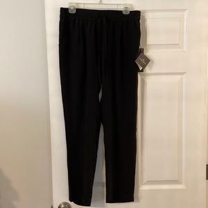 Dora Landa 100% silk pants size L brand new with tags color black